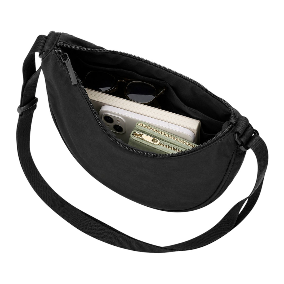 Sac banane demi-lune noir en nylon pour femme, avec poche intérieure, idéal pour un usage quotidien.