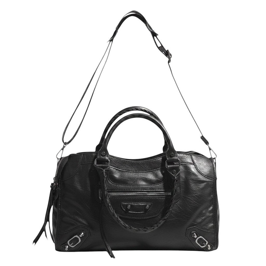 Univers Sac black faux leather saddle shoulder bag with braided handle detail and single strap.