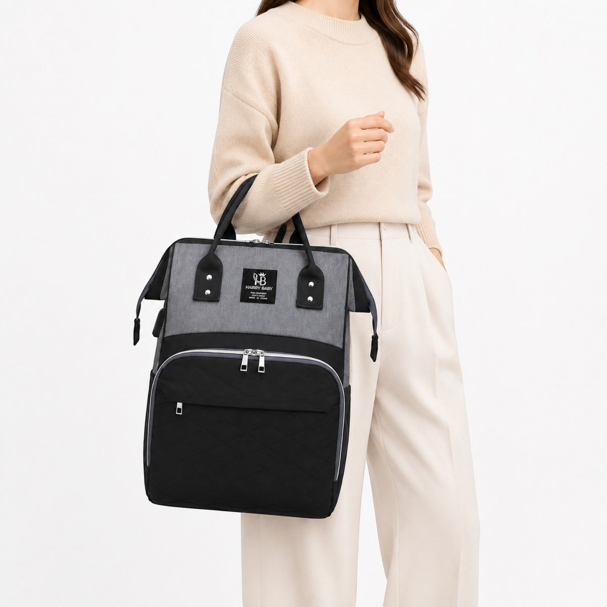 Sac à langer Univers Sac gris et noir en tissu Oxford, grand format pratique pour maman avec poignées et bretelles.