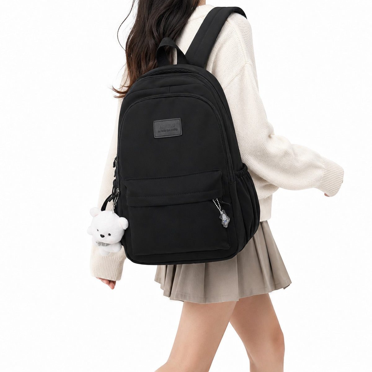 Sac à dos noir en coton imperméable Univers Sac, avec poches extérieures et bretelles réglables, idéal pour femme.