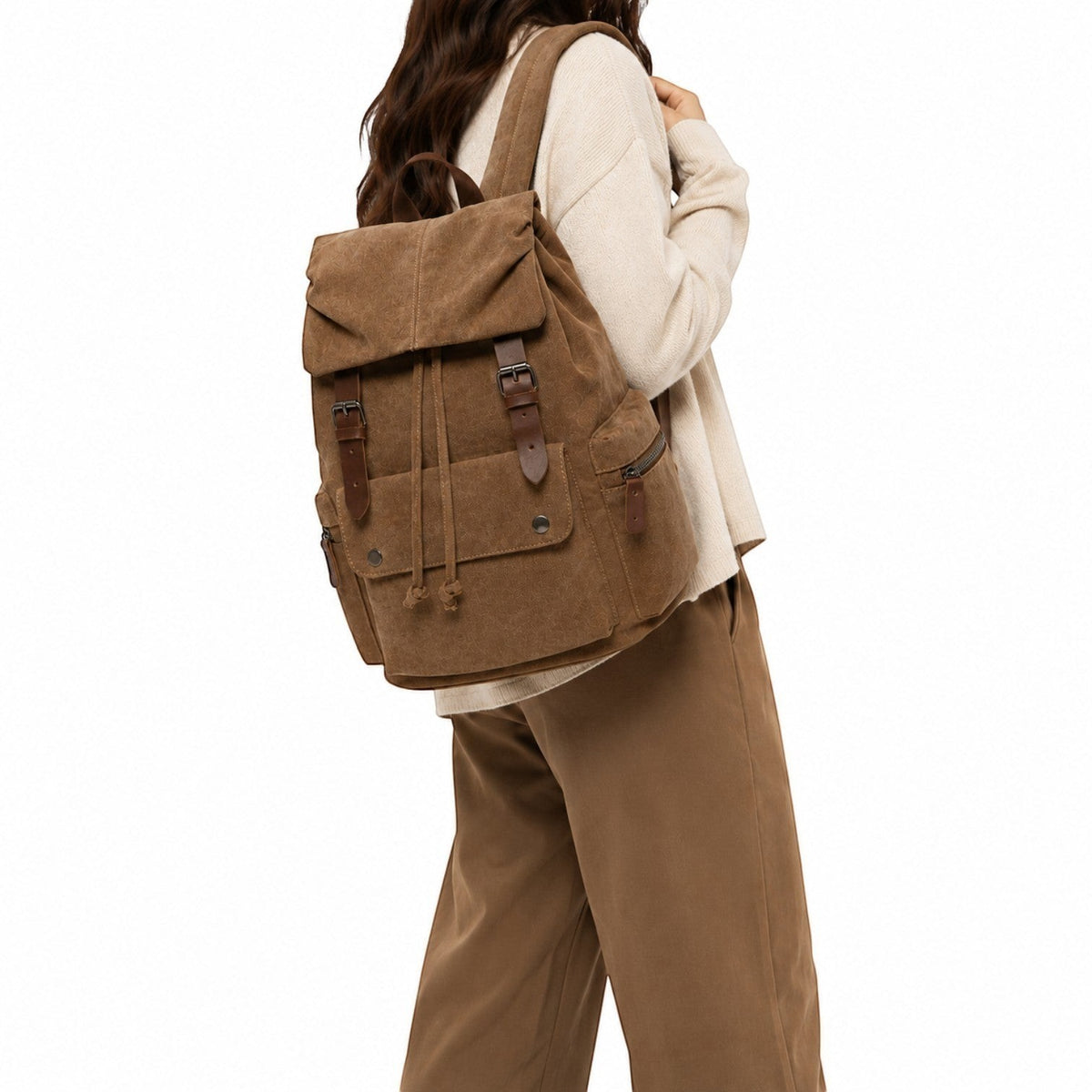 Sac à dos vintage en toile marron Univers Sac avec détails en cuir, idéal pour les cours ou les voyages.