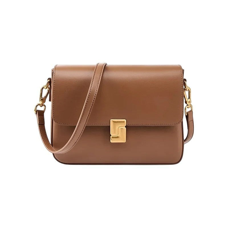 Sac bandoulière marron en cuir véritable pour femme, avec fermoir doré et bandoulière réglable. Univers Sac.
