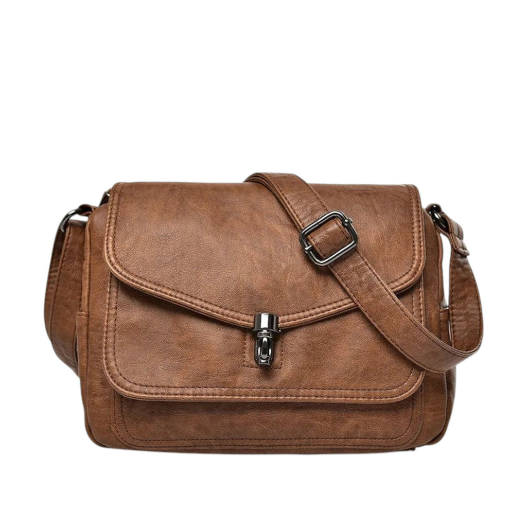 Sac bandoulière vintage en cuir PU marron, avec fermeture à fermoir métallique et bandoulière réglable. Idéal pour un usage quotidien.