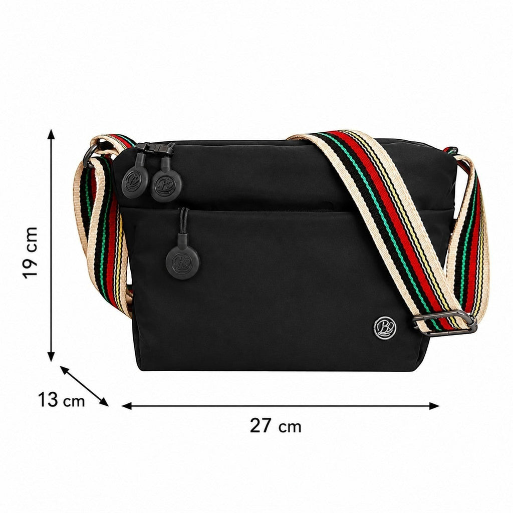 Sac bandoulière noir en nylon et coton bio, ultra léger, avec une sangle multicolore rayée et fermeture éclair. Dimensions : 19x13x27 cm.