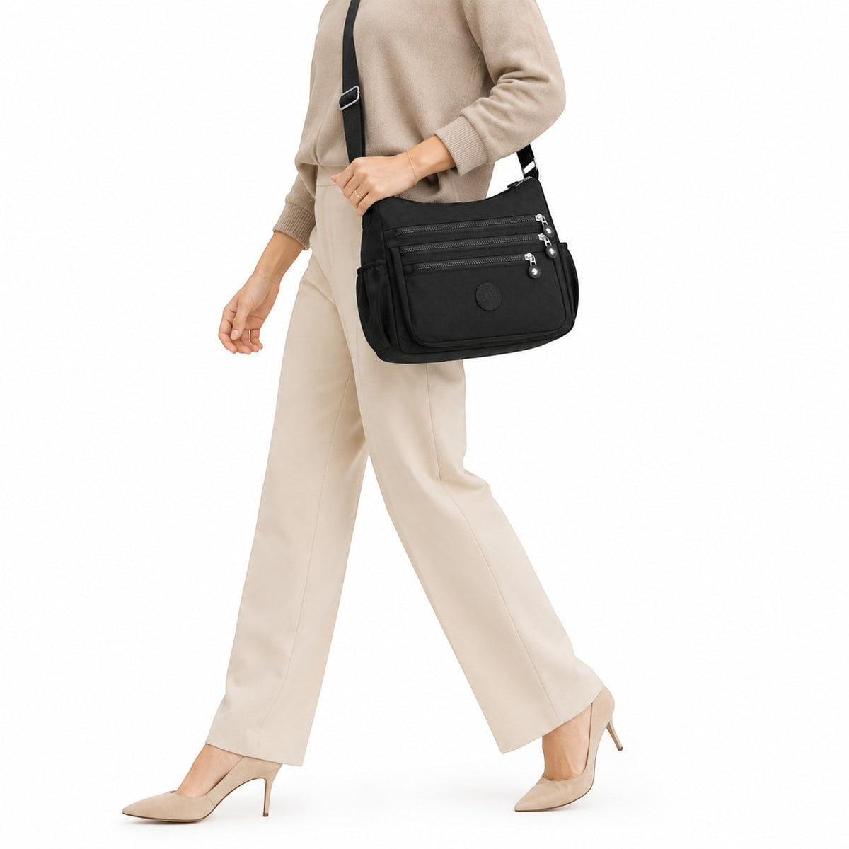 Sac bandoulière noir en nylon Univers Sac avec plusieurs poches zippées et une poche latérale, idéal pour le voyage.