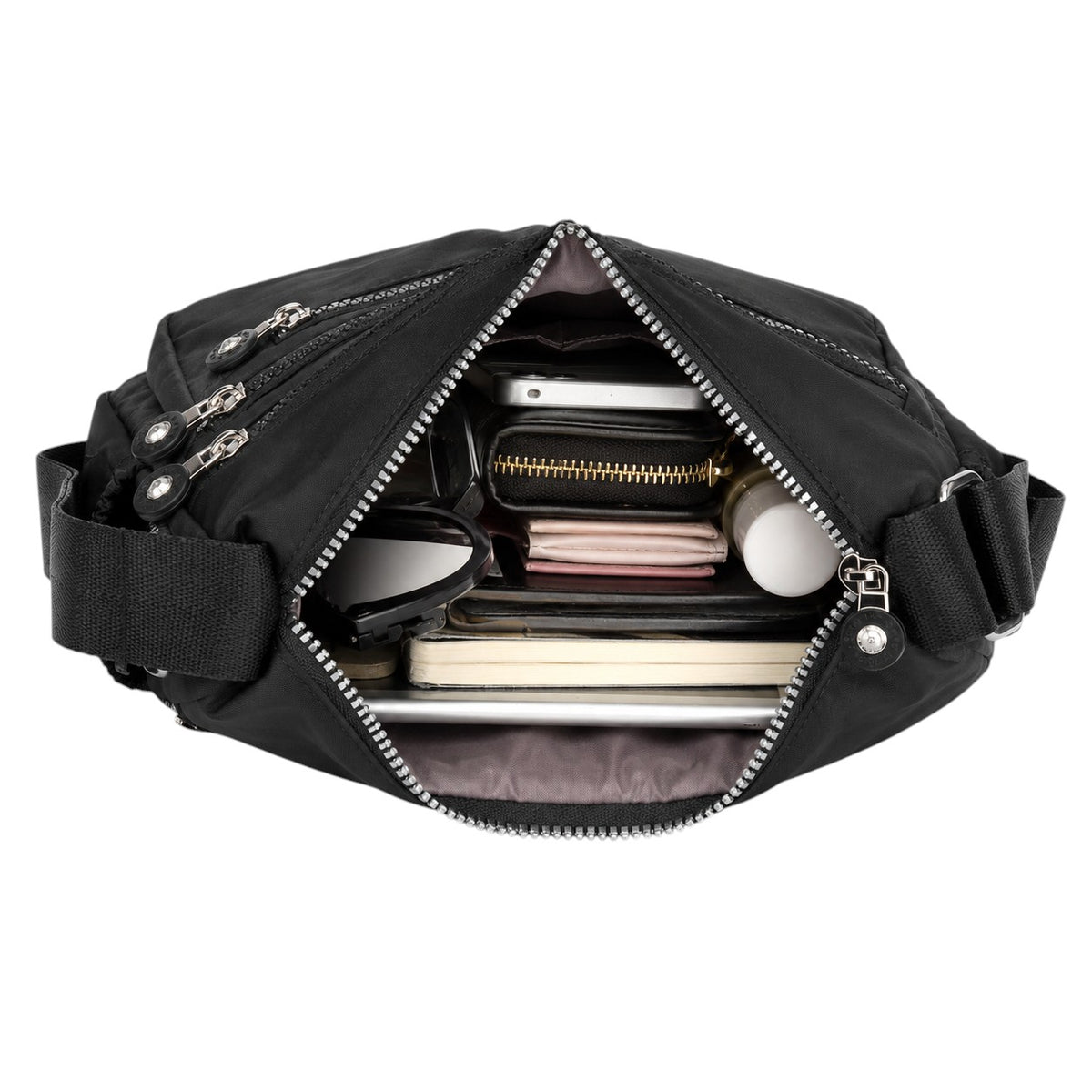 Sac bandoulière noir en tissu Oxford, idéal pour le voyage, avec compartiments intérieurs et fermeture éclair.