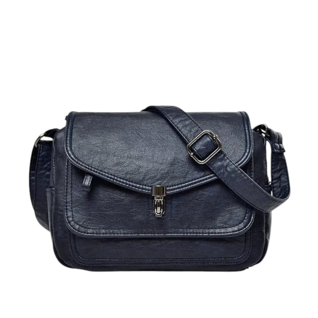 Sac bandoulière vintage bleu marine en PU, avec fermeture à fermoir métallique et poche intérieure.