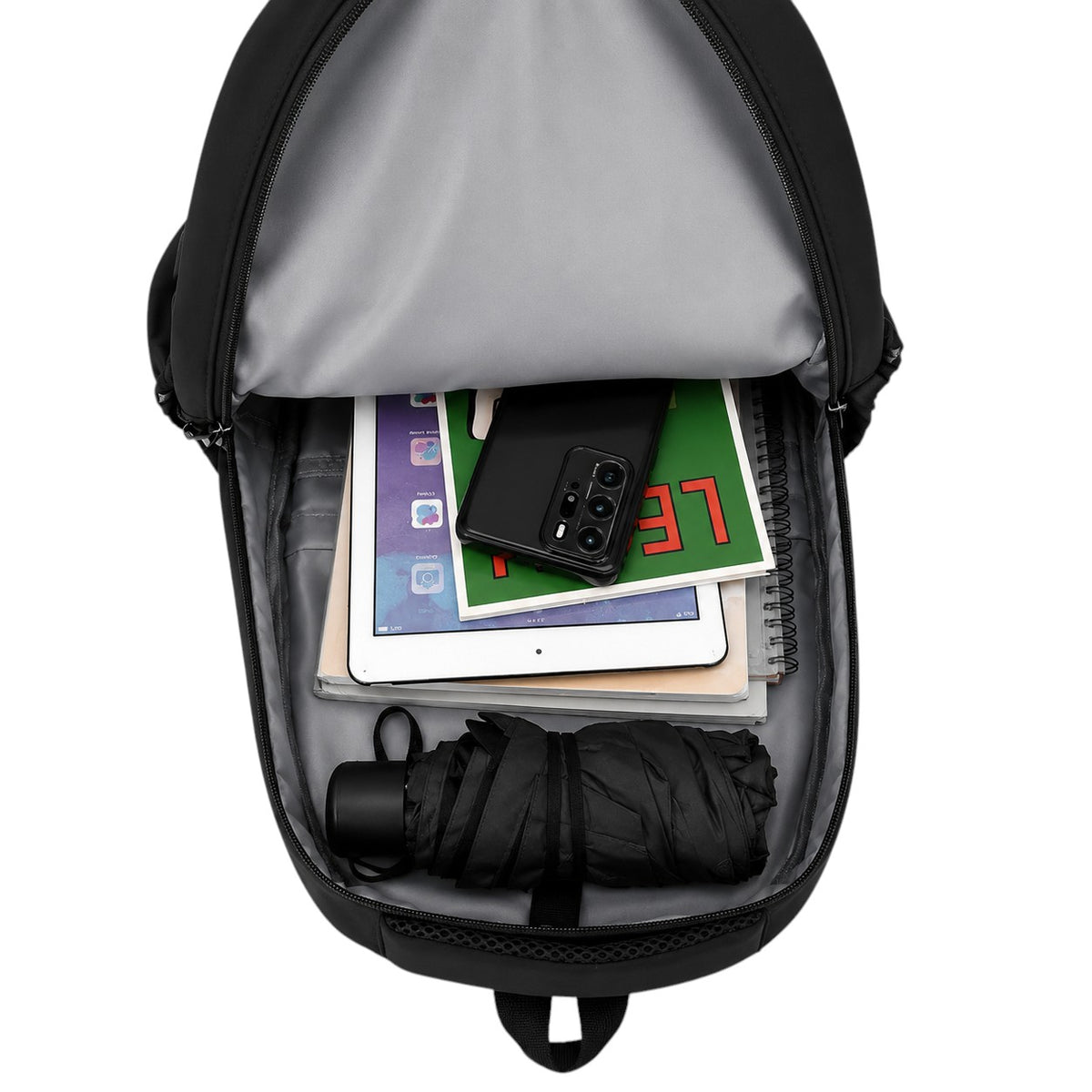 Sac à dos noir en coton imperméable Univers Sac, compartiment principal avec tablette, téléphone et parapluie plié.