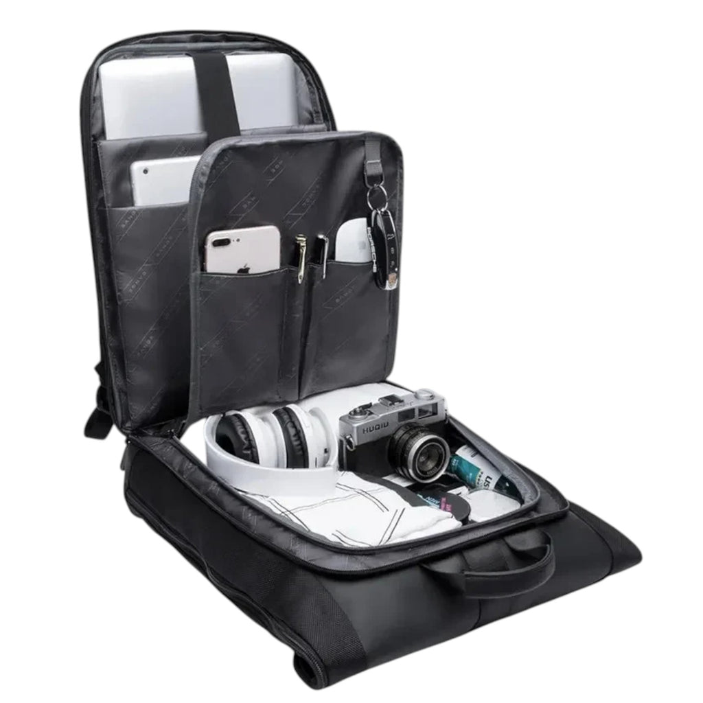 Sac à dos noir en Oxford imperméable de la marque Univers Sac, avec compartiments pour ordinateur portable, tablette, téléphone, appareil photo et casque.