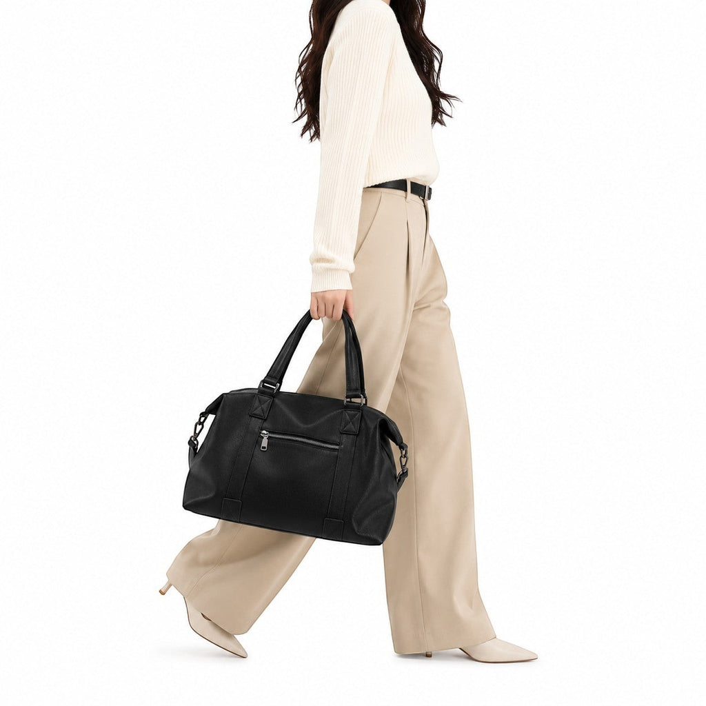Sac fourre-tout noir en cuir synthétique UOSU avec fermeture éclair et deux anses, idéal pour un usage quotidien.