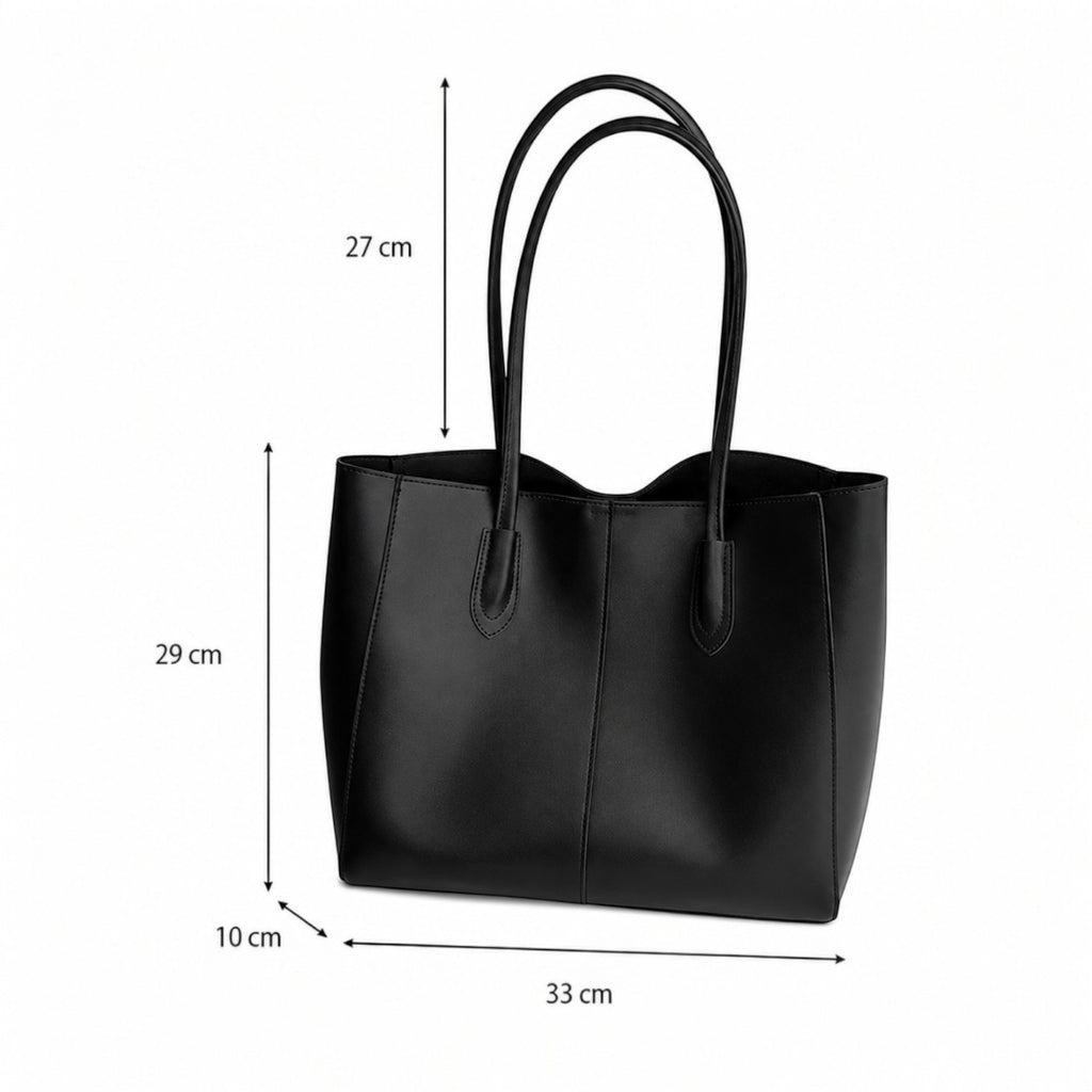 Sac fourre-tout noir en cuir PU souple, style lady, avec fermeture à boucle magnétique et poche intérieure zippée. Univers Sac.
