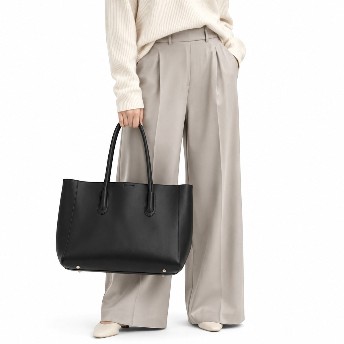 Sac fourre-tout noir en cuir PU pour femme, style décontracté, avec fermeture à boucle magnétique et poche intérieure zippée.