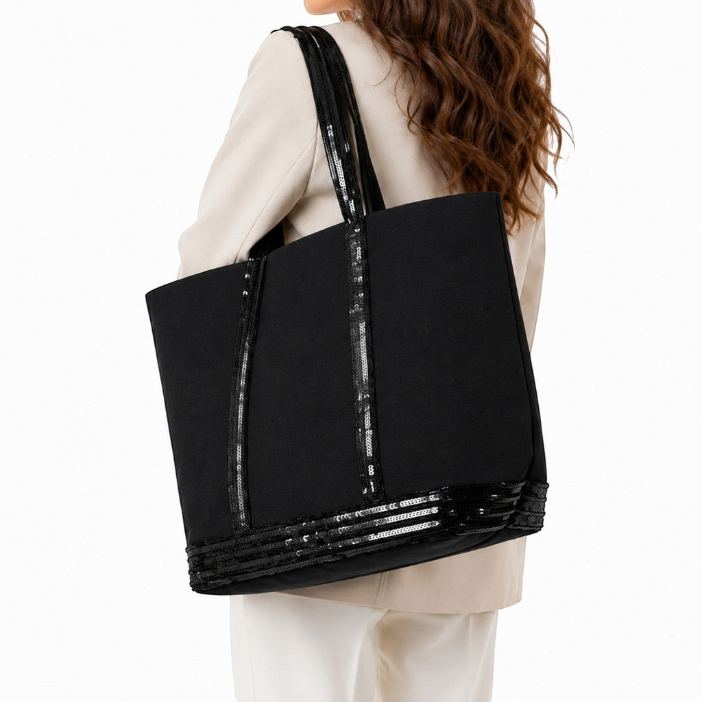 Sac fourre-tout noir en toile avec garniture à paillettes noires, anses réglables, de la marque Univers Sac.