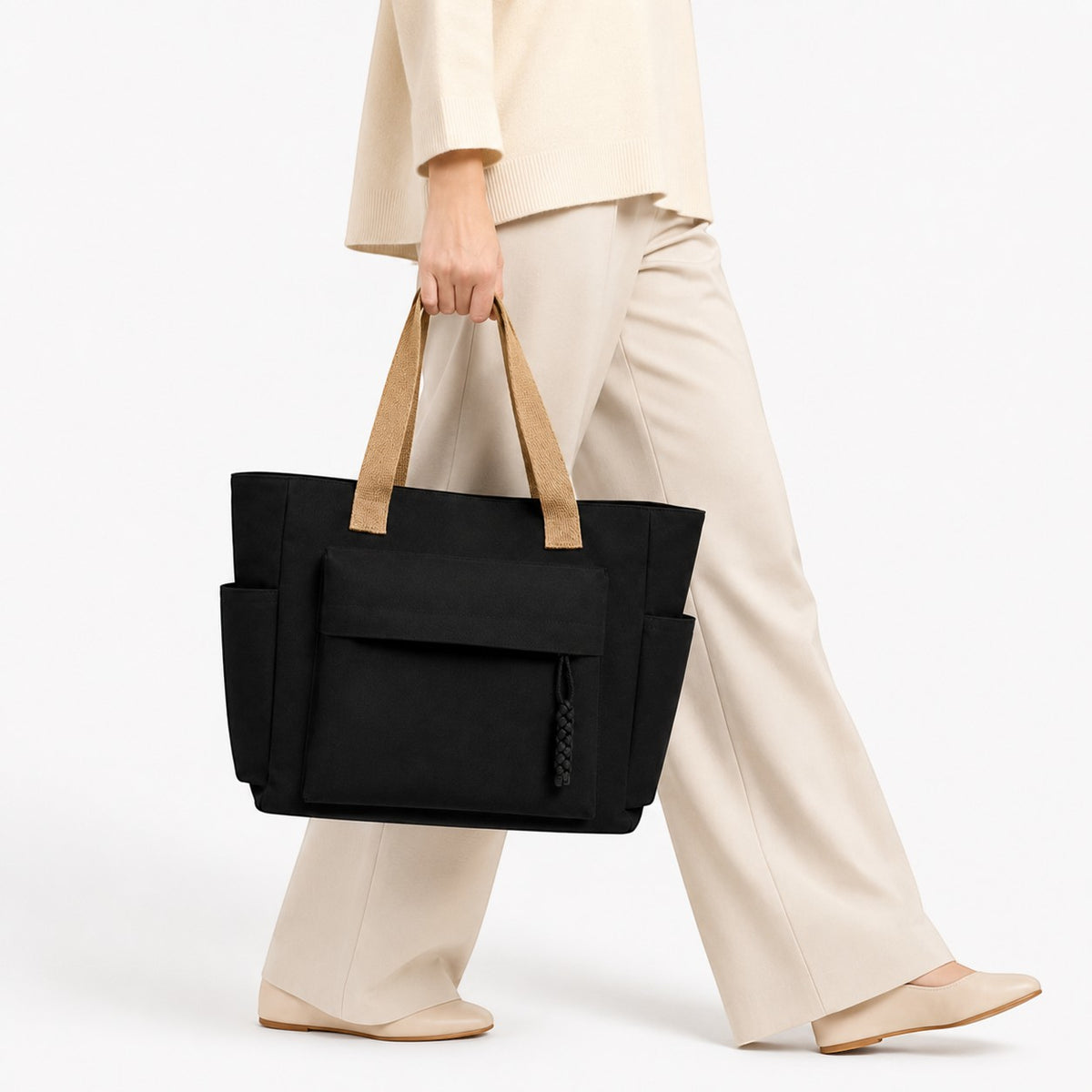 Sac fourre-tout noir en toile Univers Sac avec anses contrastantes et poches extérieures, idéal pour un usage quotidien.