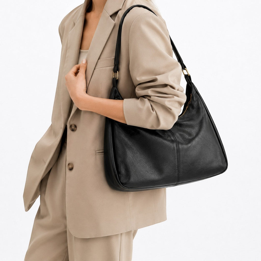 Univers Sac sac à main bandoulière noir en cuir PU souple avec fermeture éclair et poche intérieure.