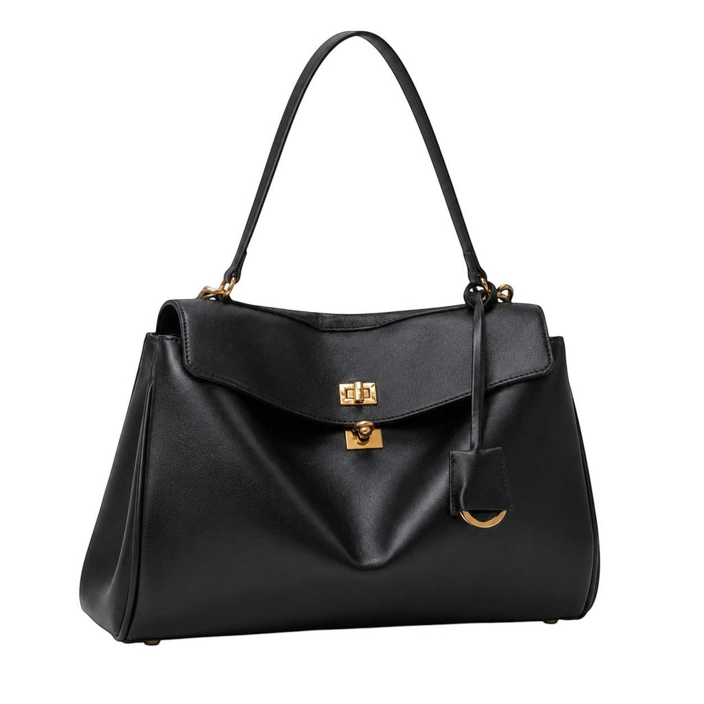 Sac à main noir en cuir de vache souple, style satchel, avec fermoir doré et bijou de sac détachable. Univers Sac.