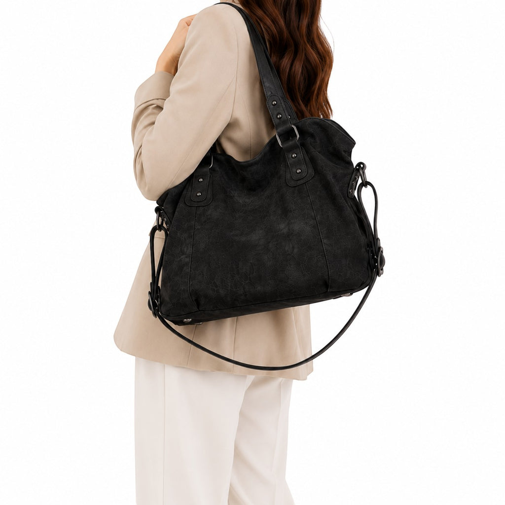 Sac à main noir en cuir PU vintage Univers Sac avec détails rivets et pompons, idéal pour femme.
