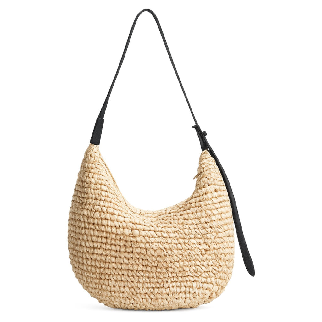 Sac à main femme en paille beige texturé avec bandoulière noire, fermeture éclair, style décontracté.