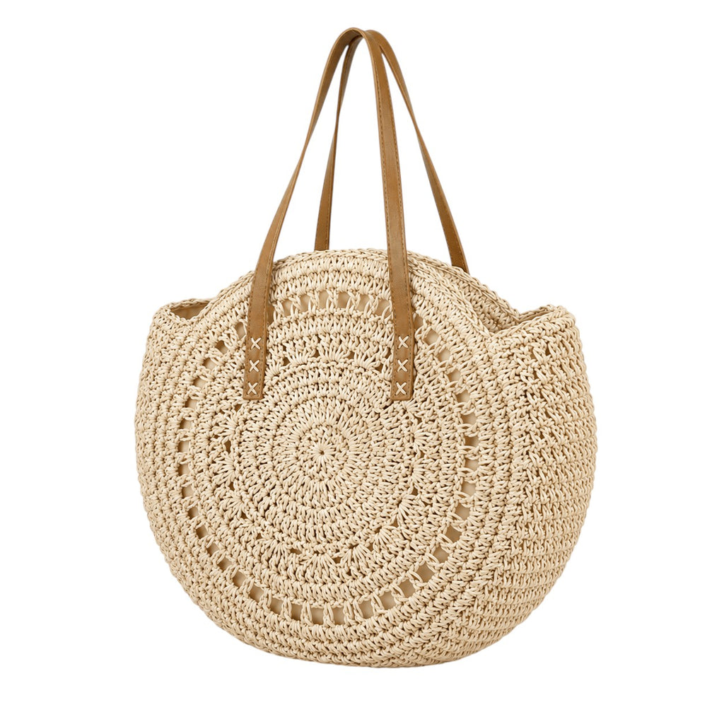 Sac à main rond en paille beige avec anses en cuir marron, par Univers Sac.