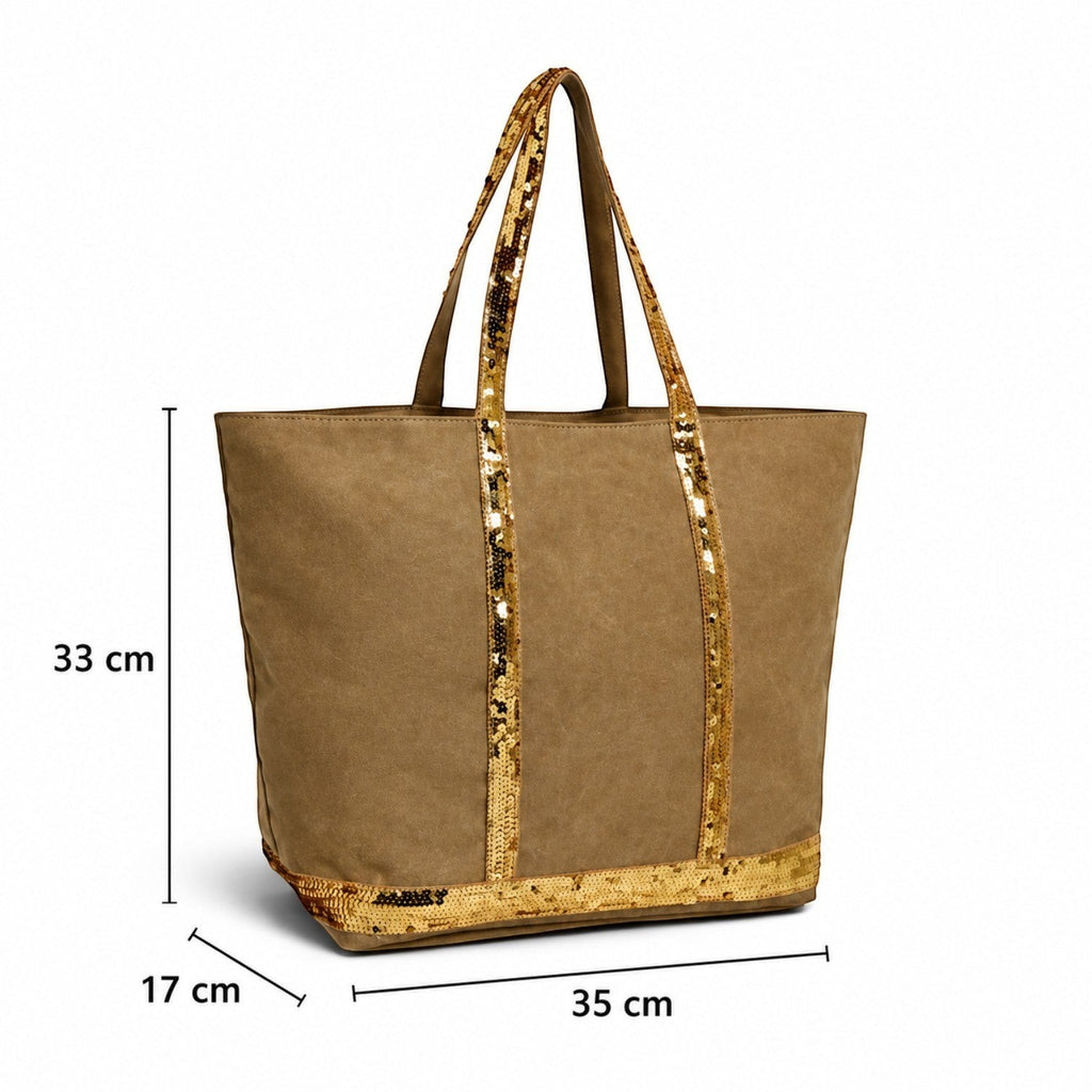 Sac fourre-tout en toile marron de la marque Univers Sac avec des détails de paillettes dorées sur les anses et le bas. Idéal pour la plage ou les courses.