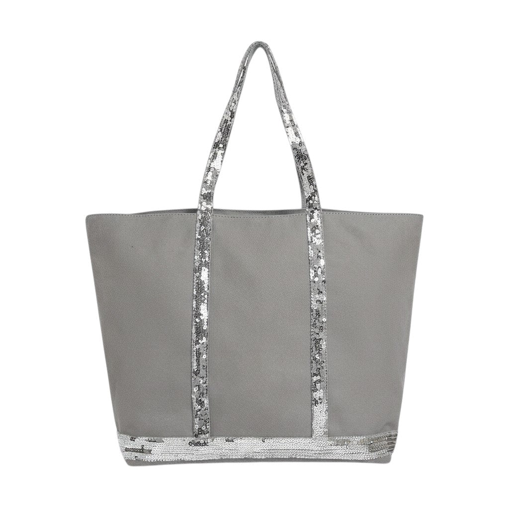 Sac fourre-tout gris en toile Univers Sac avec des détails de paillettes argentées sur les poignées et le bord inférieur.